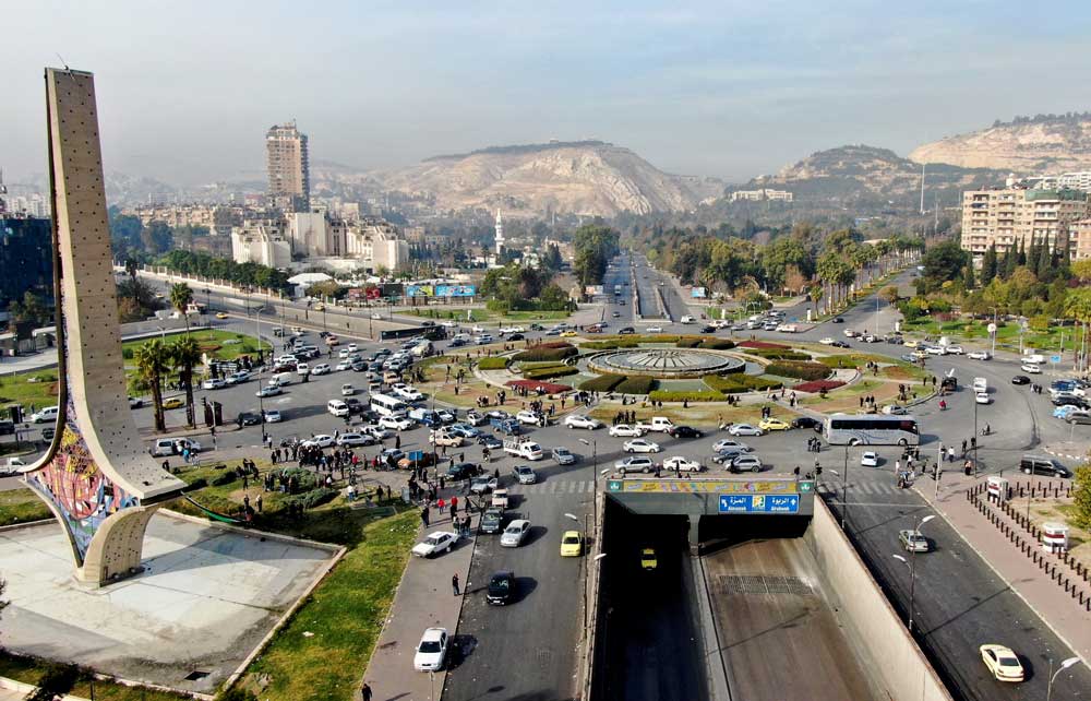 إعادة بناء الاقتصاد السوري .. خطط حكومية بين الخصخصة والاستثمار الأجنبي