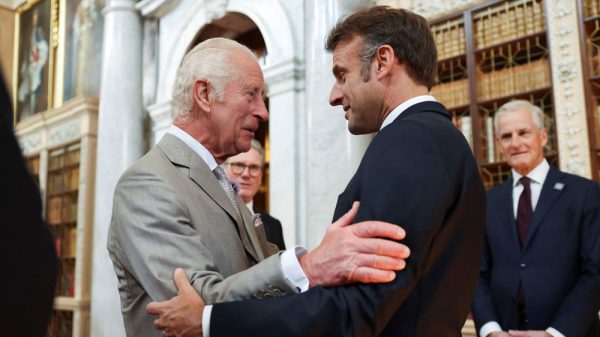 Trump’s Tariffs Loom Over Macron’s Historic U.K. State Visit